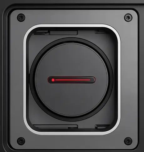 Black rotary dial with a red indicator light in a square frame with screws on corners.